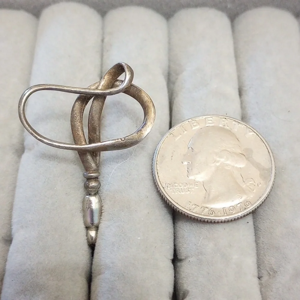 Vintage calla lily flower pin marked MoMA and sterling